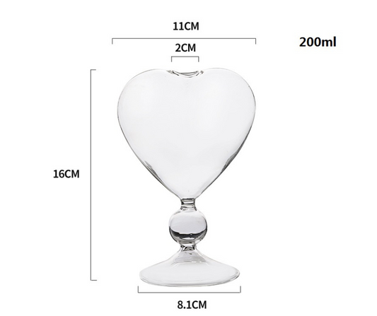 Heart-shaped cocktail glass container with dimensions on a white background