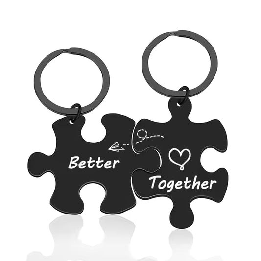 Black puzzle piece keychains with 'Better Together' text on a white background