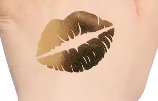 Gold lip temporary tattoo on a person