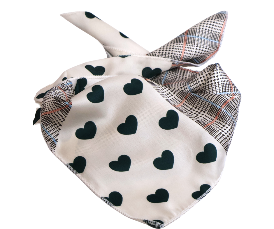 Scarf with heart pattern and plaid border on a white background