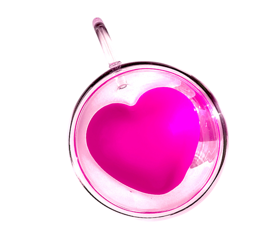 Pink heart-shaped double walled mug filled with pink liquid