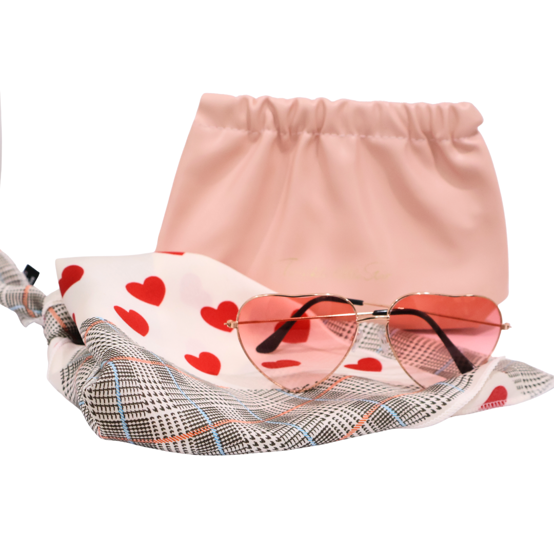 Bridesmaid bundle featuring Heart-shaped sunglasses with a pink makeup bag, heart designed scarf on a white background