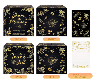 Black and gold memory box with floral designs and printed cards on a white background