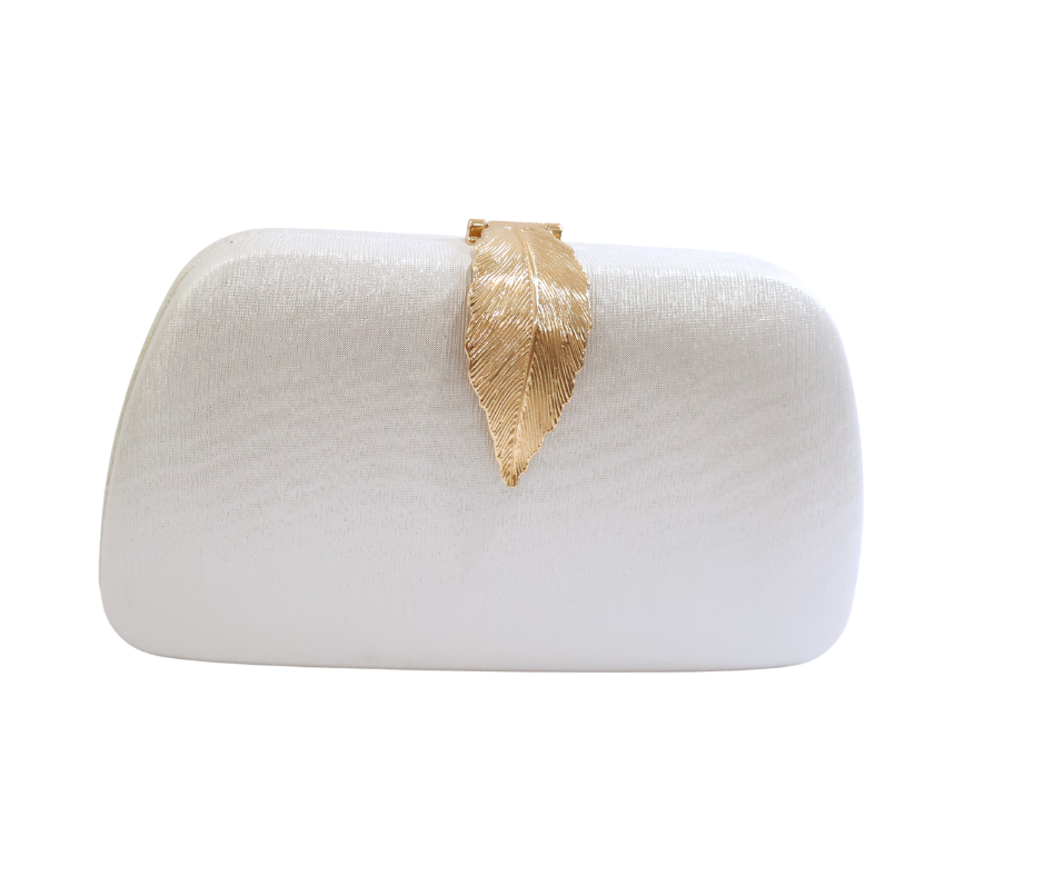 White clutch bag with a gold leaf detail on a white background