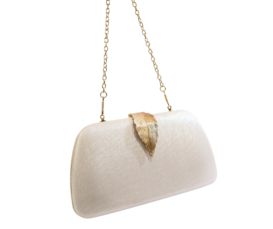 White Bridal clutch bag with gold leaf detail and chain strap on a white background
