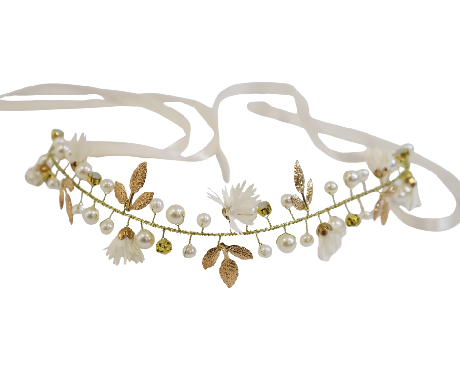 Floral headband with pearls and leaves on a white background