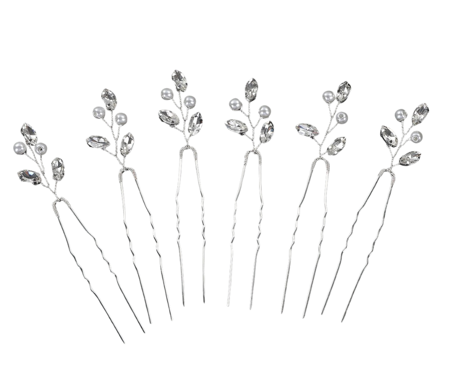 Set of silver hairpins with small crystals on a white background