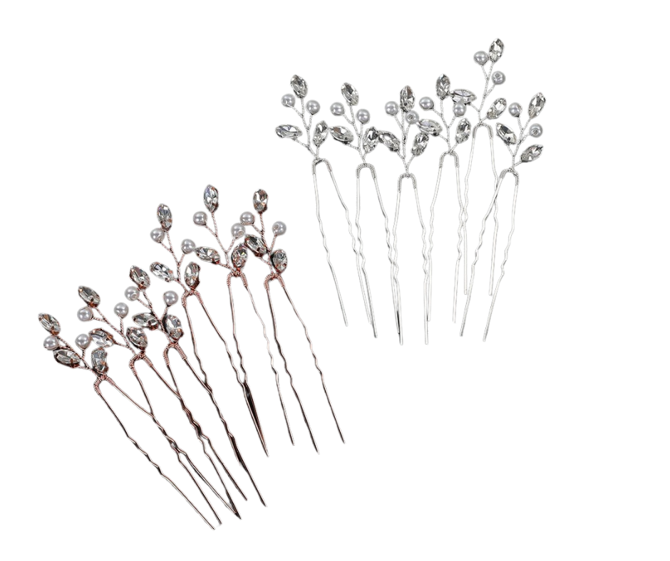 Set of decorative rhinestone hair pins on a white background