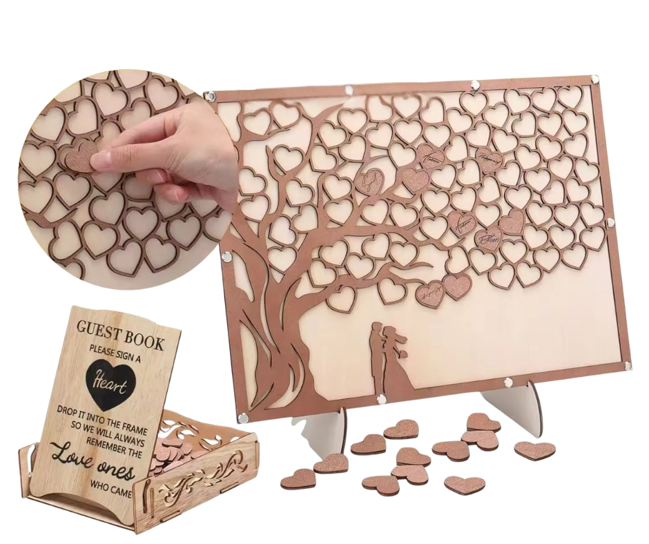 Wooden heart-shaped guest book with hearts and a tree design, including a hand holding a heart and a small box labeled 'Guest Book'.