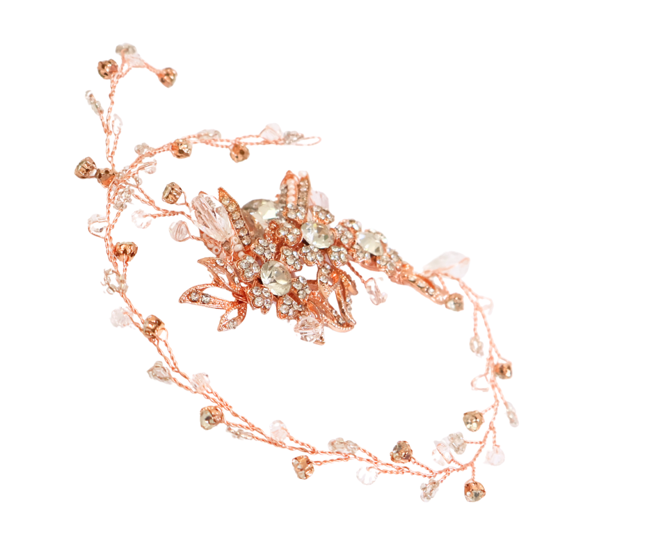 Delicate rose gold rhinestone hair piece with small beads on a white background