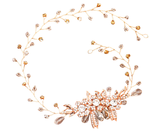 Rose gold floral headpiece with crystals on a white background