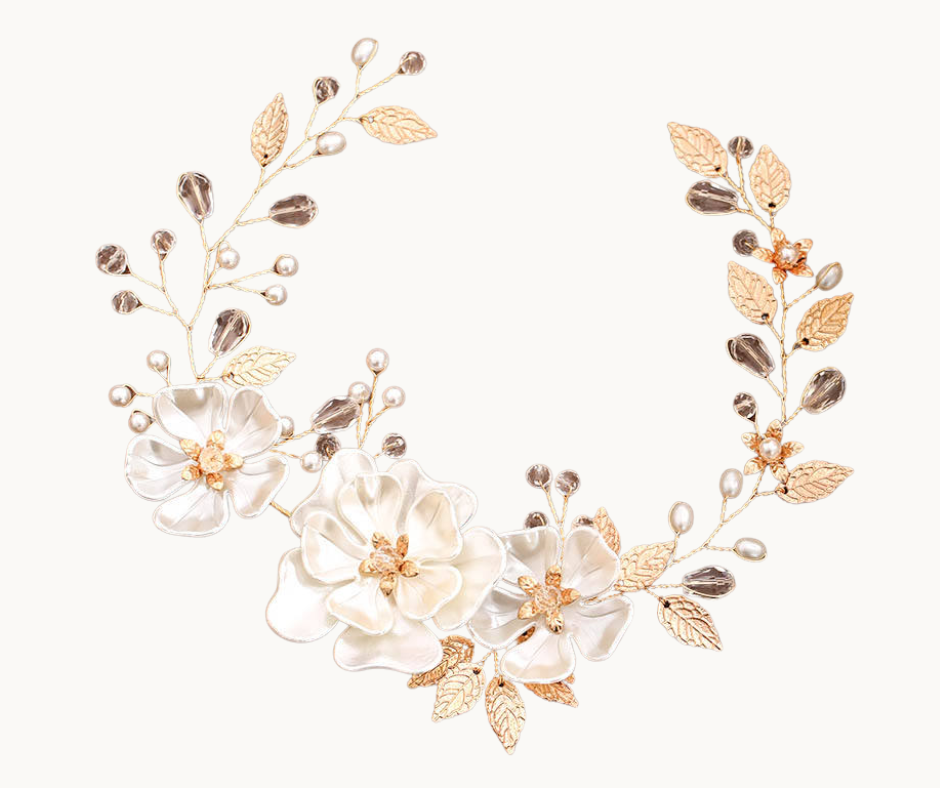 Decorative floral hairpiece with gold and silver accents on a white background