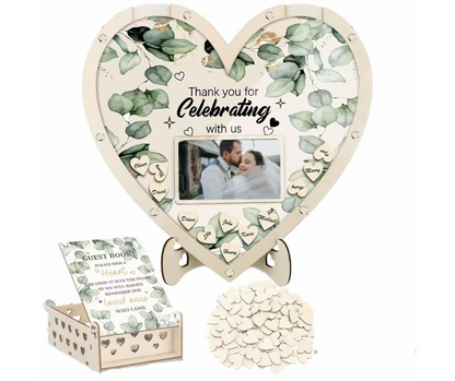 Heart-shaped wedding guest frame with decorative elements and a small card on a white background