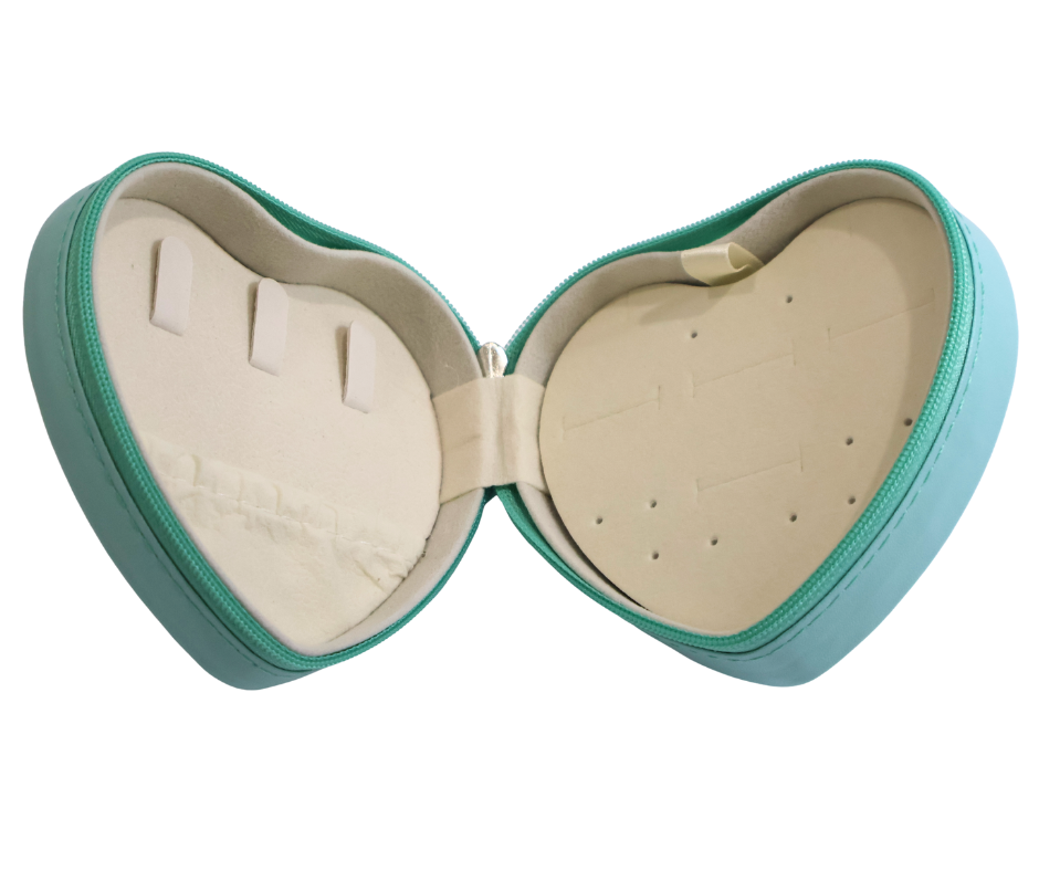 Heart-shaped jewellery box with blue exterior and beige interior on a white background
