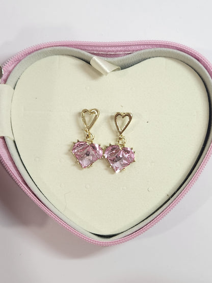 Pink gemstone earrings in a heart-shaped jewelry box