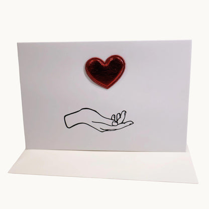 Heart In Hand Metallic Heart Card