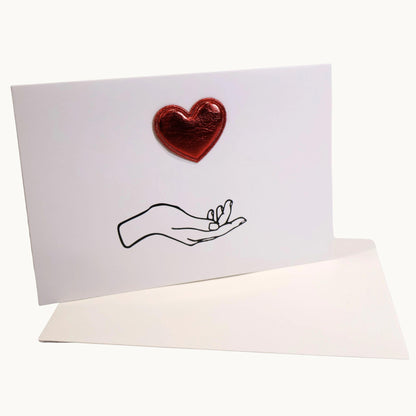 Heart In Hand Metallic Heart Card