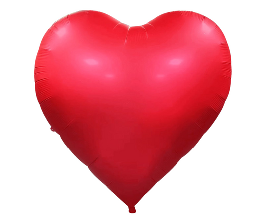 Red heart-shaped balloon on a white background