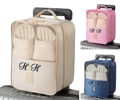 Three travel shoe bags in beige, pink, and blue on suitcases with 'Hitch House' branding.