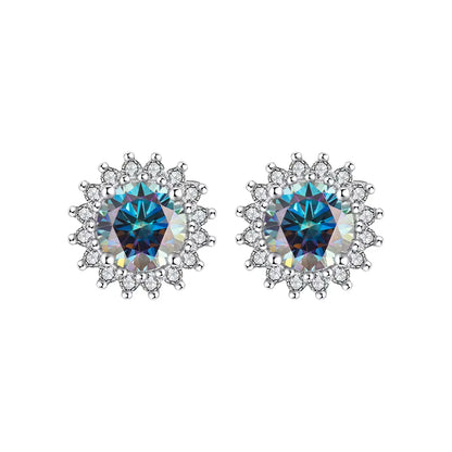 Pair of something blue sunflower earrings with blue moissanite stones  on a white background