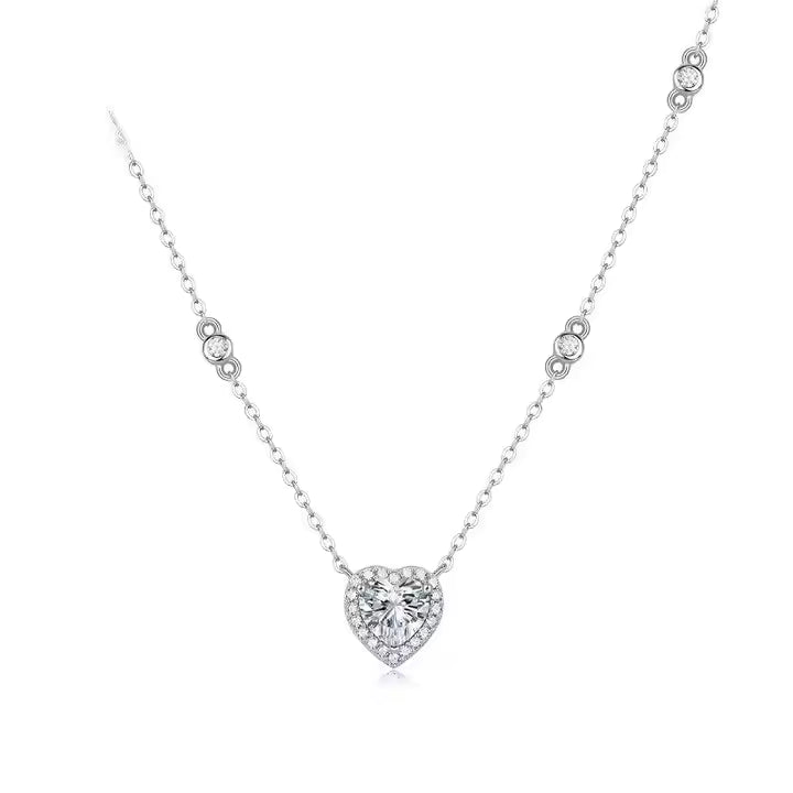 Heart-shaped moissanite necklace on a white background