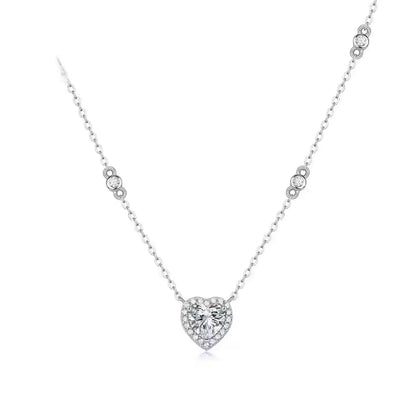 Heart-shaped moissanite necklace on a white background