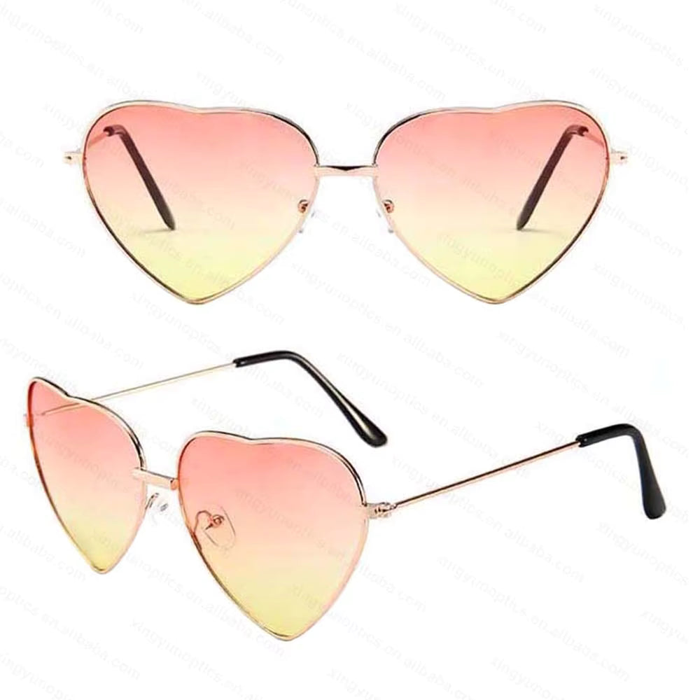 Heart-shaped sunglasses with pink and yellow gradient lenses on a white background