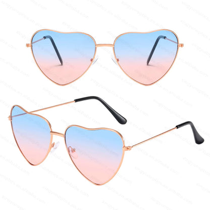 Heart-shaped sunglasses with gradient lenses on a white background