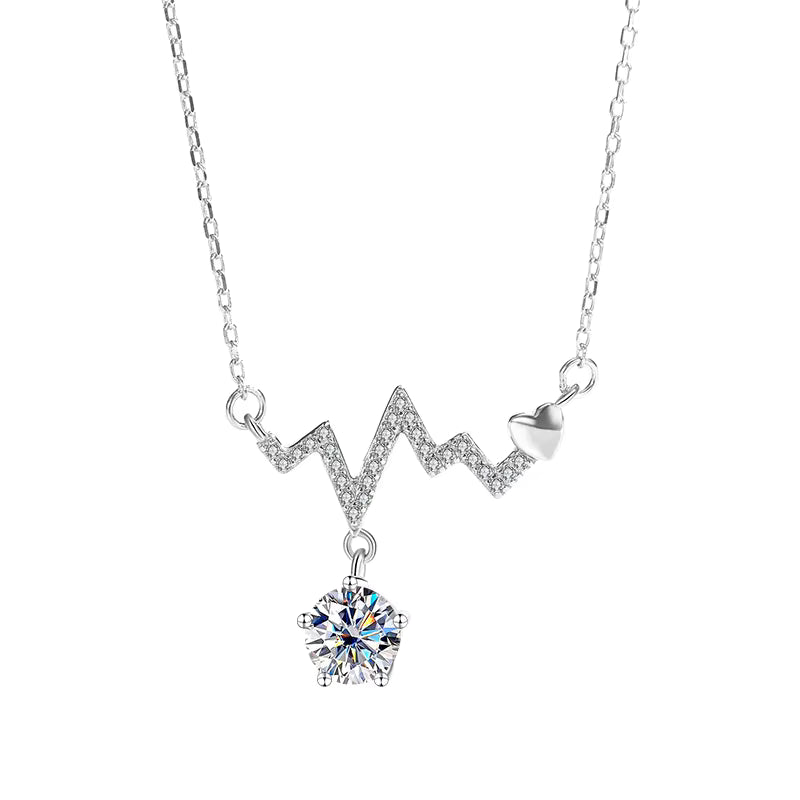 Silver necklace with a heart beat design pendant and round moissanite on a white background