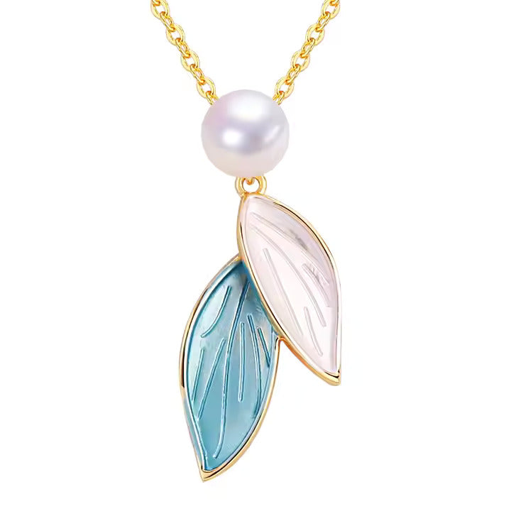 Necklace with a pearl and leaf-shaped pendant on a white background
