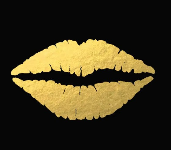 Gold lips  temporary tattoo on a black background