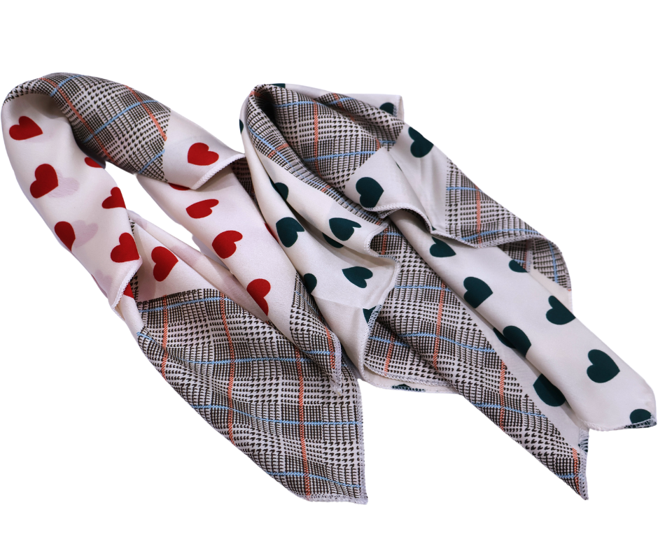 Two patterned scarves with heart and plaid designs on a white background