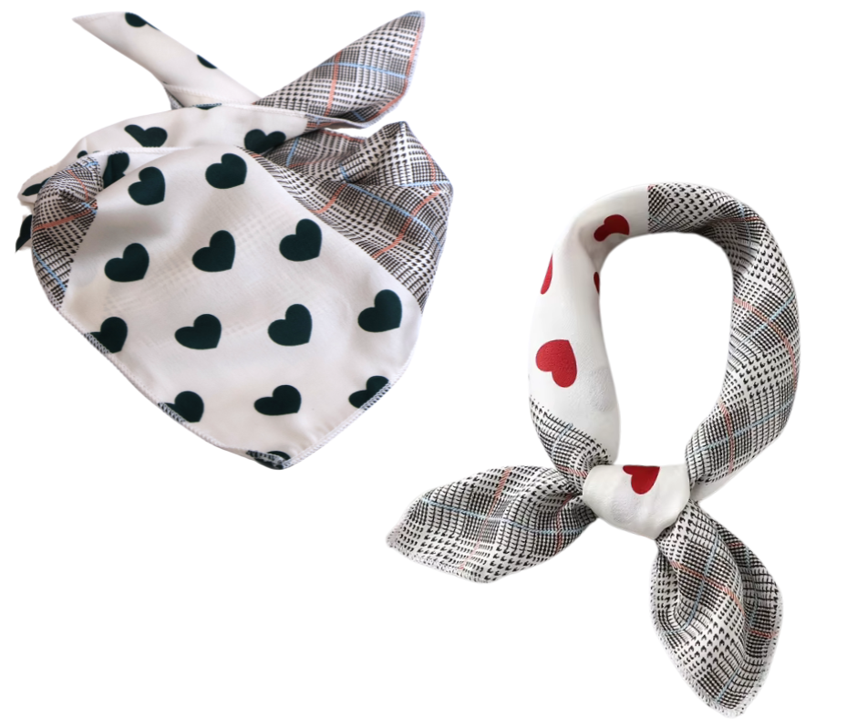 Two patterned scarves with heart designs on a white background