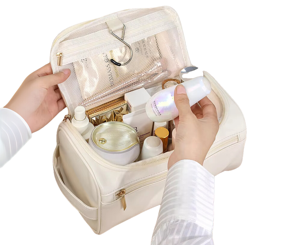 White cosmetic bag with skincare products being held by a person