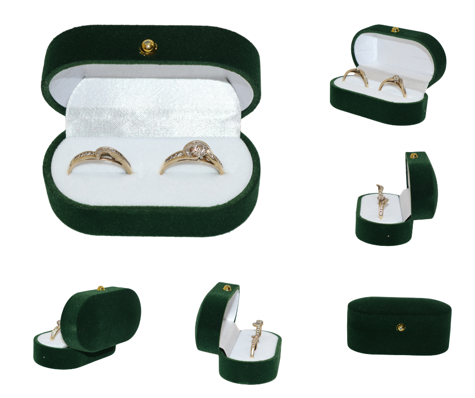 Green velvet double ring box with gold rings on a white background