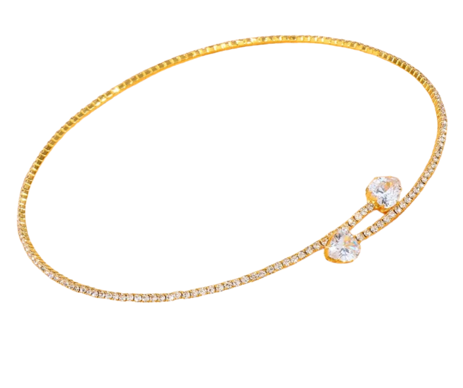 Gold choker with two heart gemstones on a white background