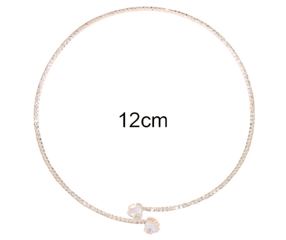 silver choker with heart stones on a white background, labelled '12cm'.