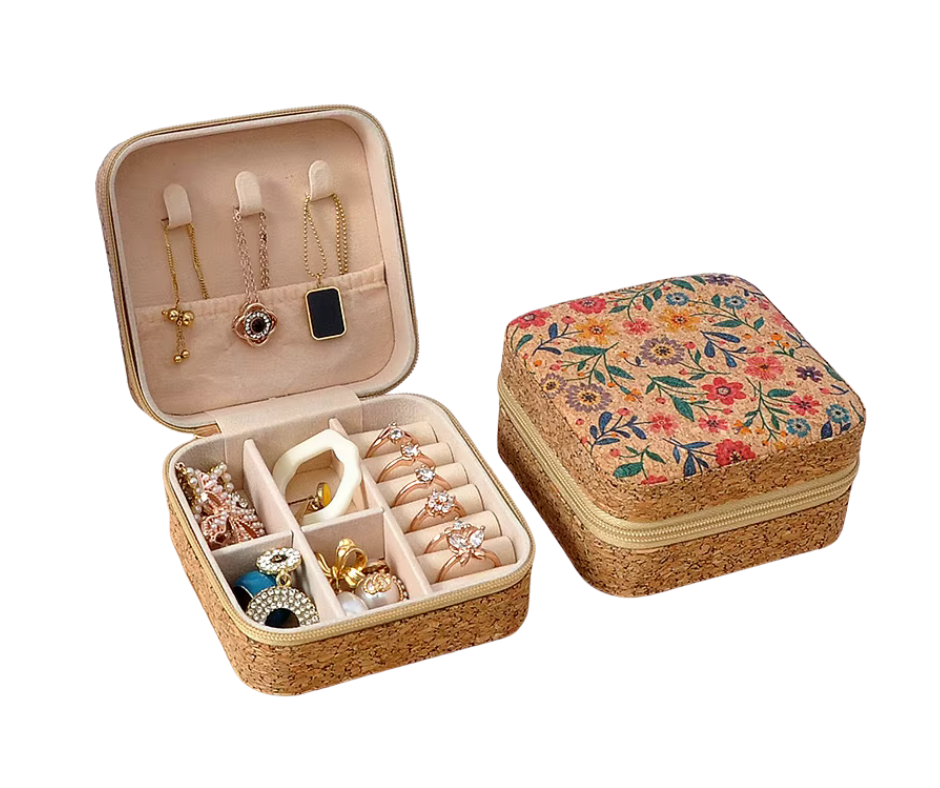 Cork Jewellery box with floral lid and cork body, containing jewellery items.